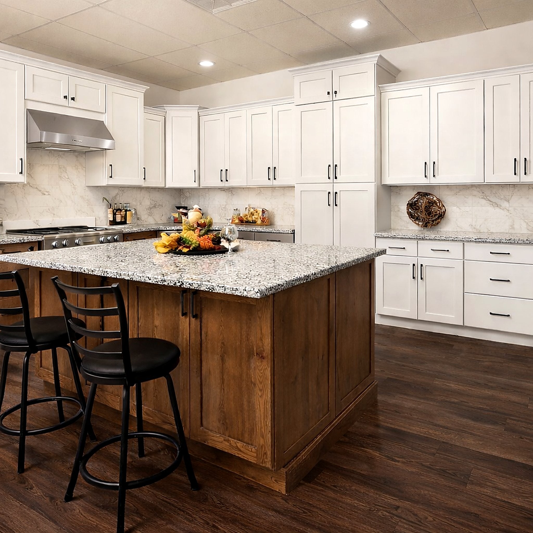 Modern Kitchen with white shaker cabinets and contrasting rustic wood island with dark wood floor and black accent hardware