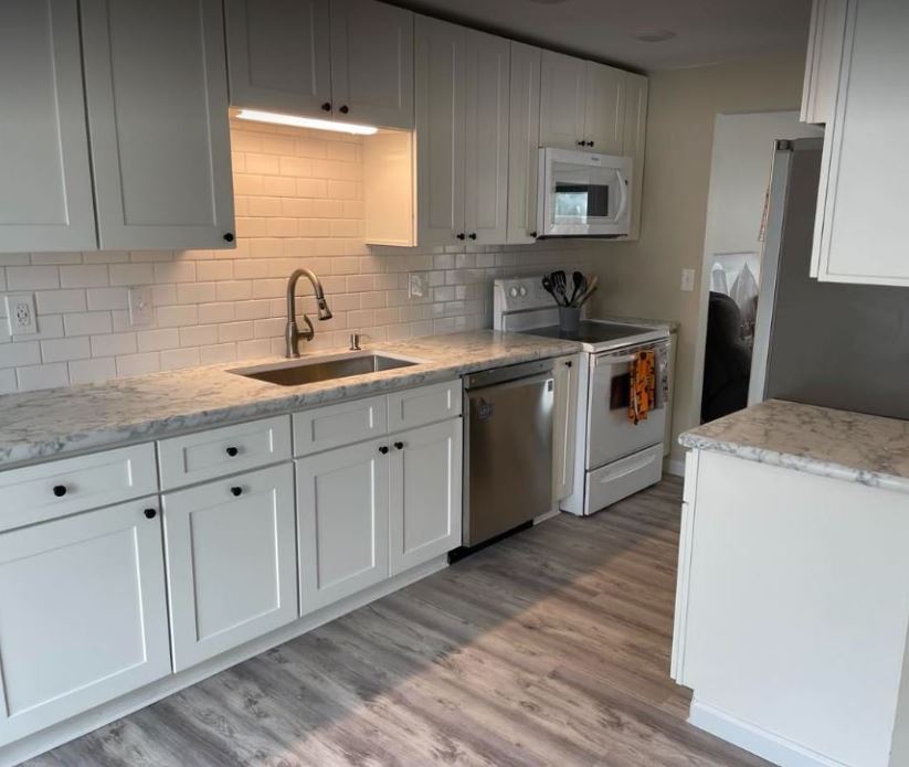 Modern white shaker kitchen, real homes, real kitchens, white and stainless appliances.