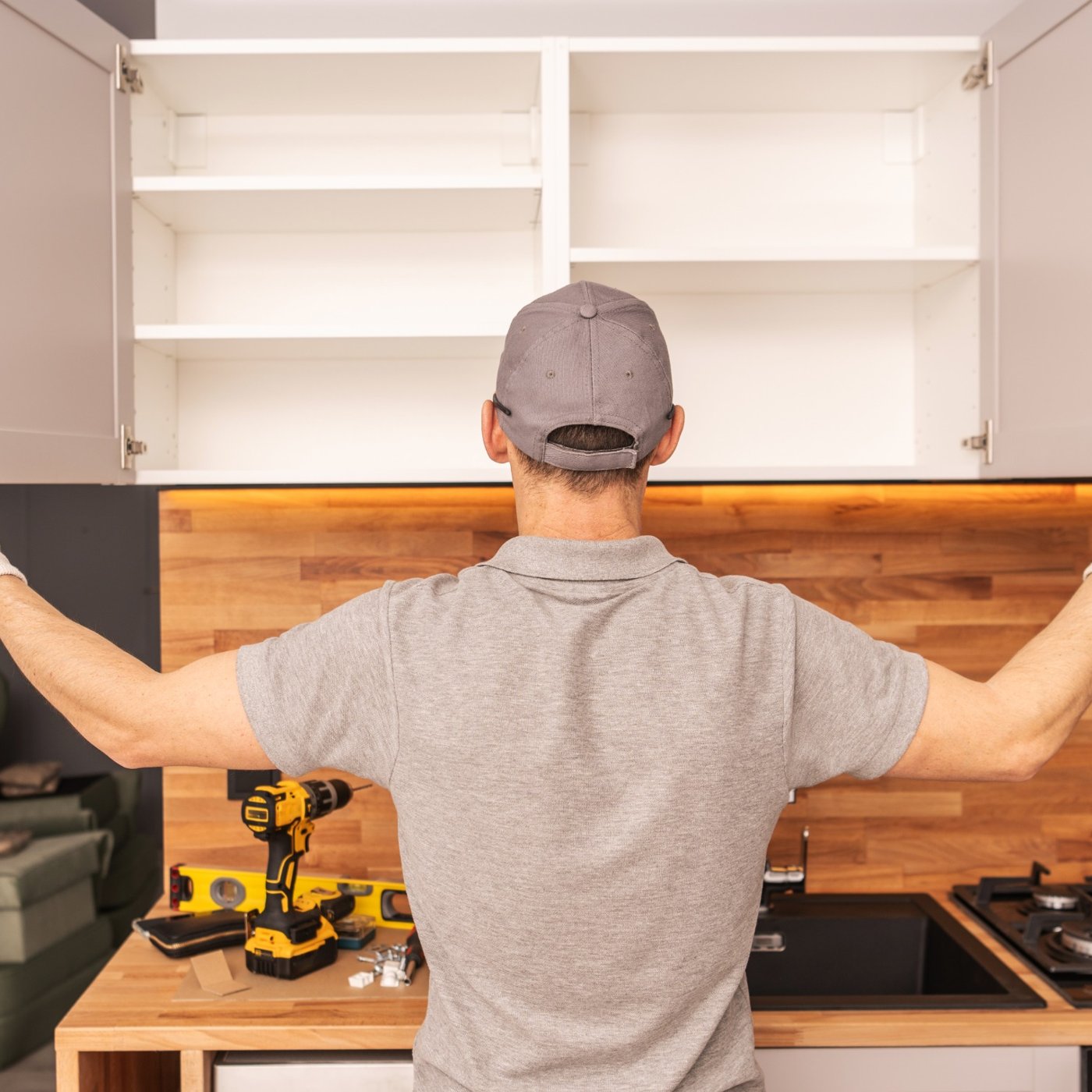 White shaker style kitchen cabinets with 1/2" plywood cabinet boxes, including sides, tops, and bottoms, providing structural stability and 3/4" plywood shelving
