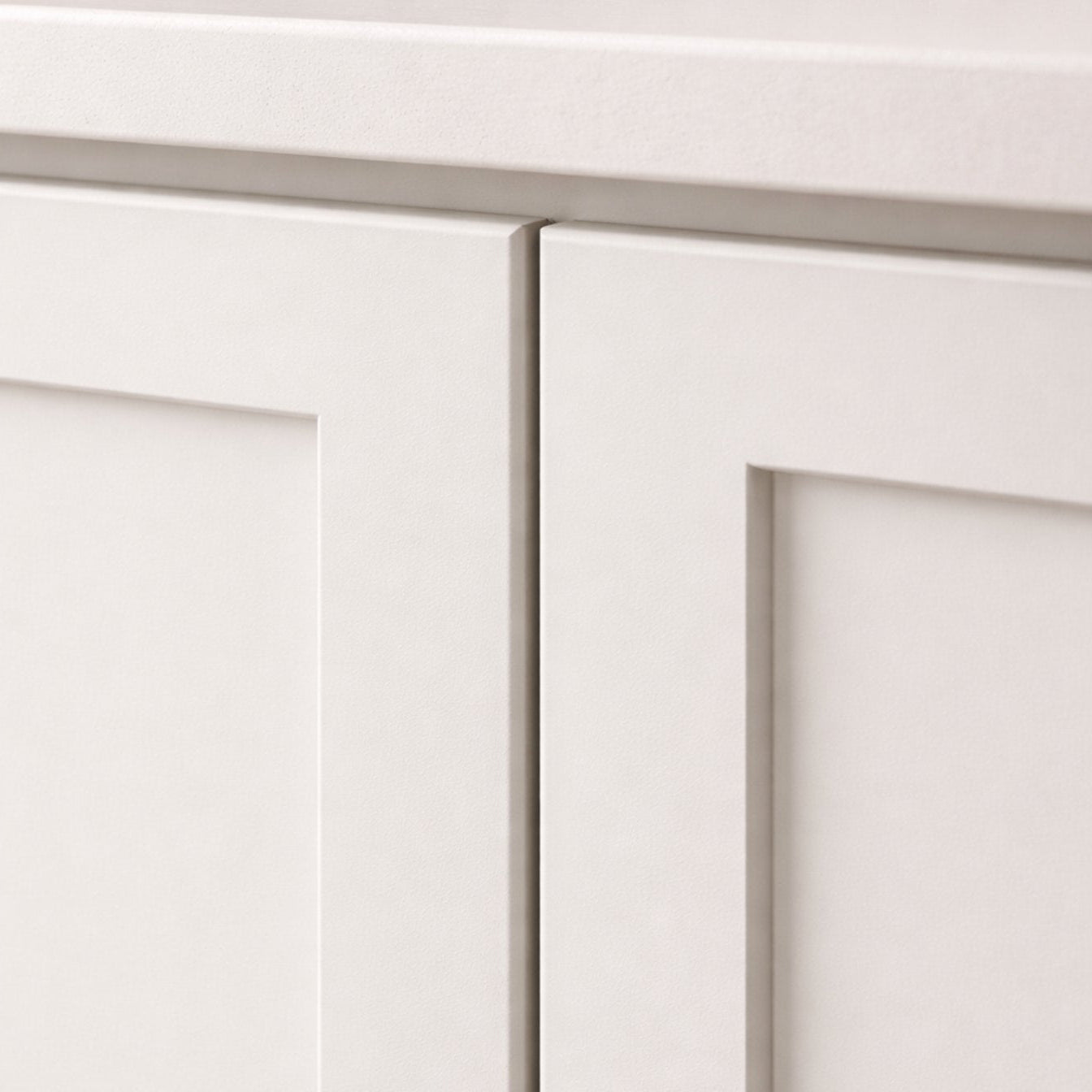 white shaker cabinets showing butt-style doors and precision milled cabinet boxes.
